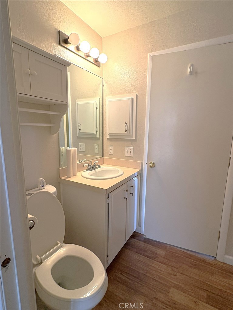 5813 Pacific Heights Road, Unit 126 Oroville, CA 95965 - Photo 33 of 59 a bathroom with a sink a toilet and a mirror