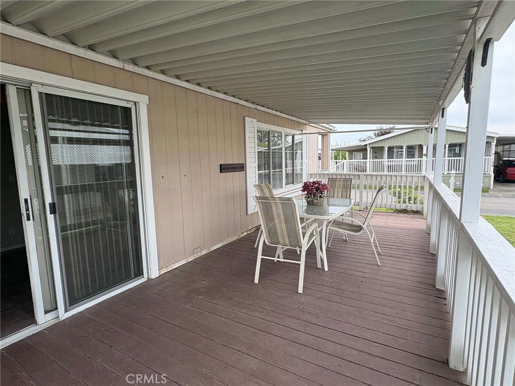 5813 Pacific Heights Road, Unit 126 Oroville, CA 95965 - Photo 41 of 59 a dining room with furniture wooden floor and garden view