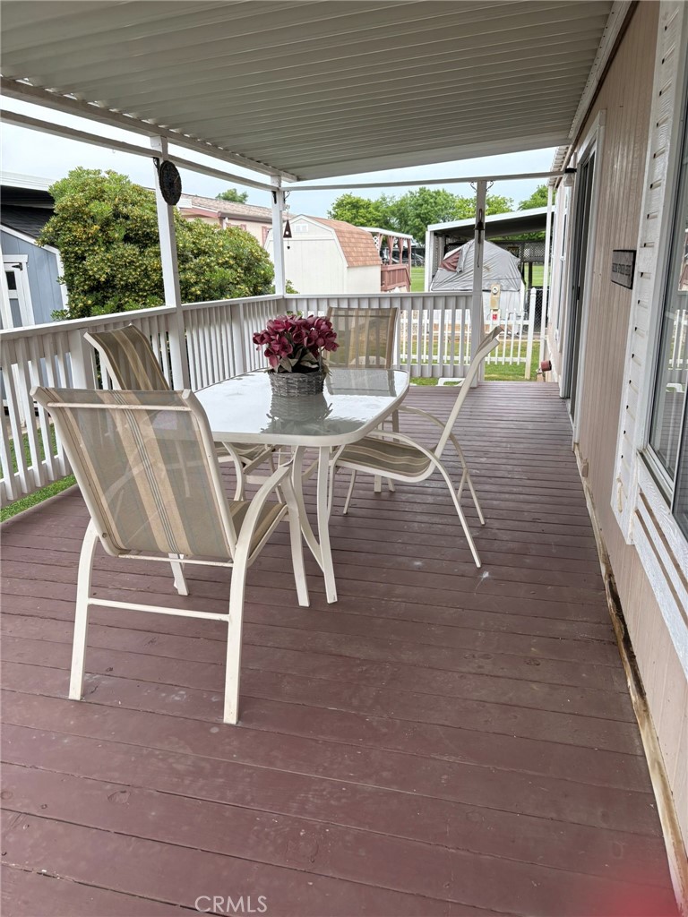 5813 Pacific Heights Road, Unit 126 Oroville, CA 95965 - Photo 44 of 59 a view of an chairs and table in the balcony