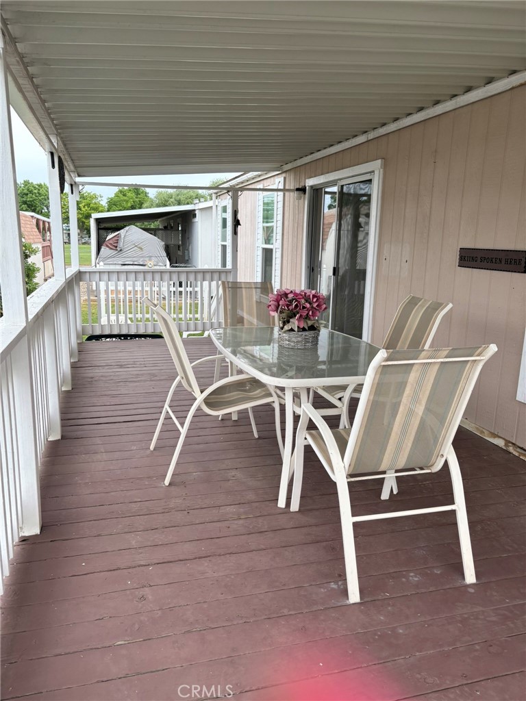 5813 Pacific Heights Road, Unit 126 Oroville, CA 95965 - Photo 45 of 59 a dining room with furniture and wooden floor