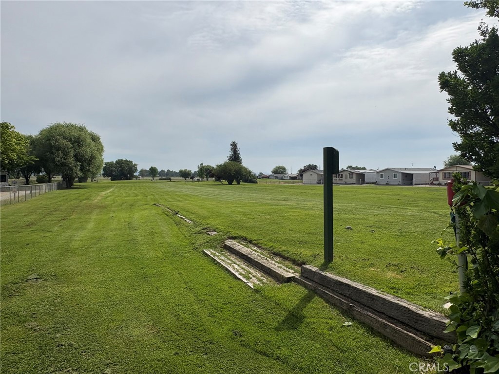 5813 Pacific Heights Road, Unit 126 Oroville, CA 95965 - Photo 59 of 59 a view of a golf course with an outdoor space