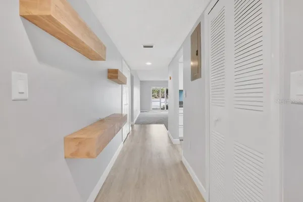a view of a hallway with a couch