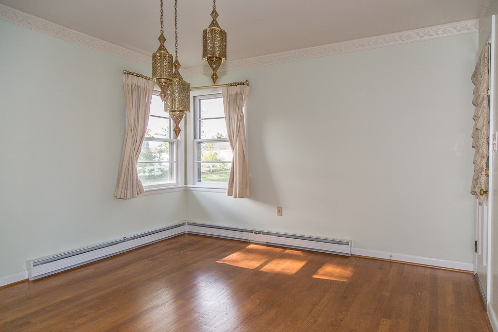 1700 Brunswick Road Waynesboro, VA 22980 - Photo 14 of 44 an empty room with wooden floor and windows