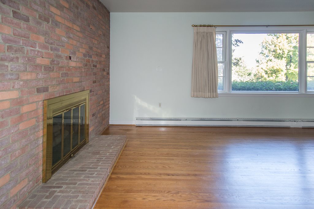 1700 Brunswick Road Waynesboro, VA 22980 - Photo 17 of 44 a view of empty room with wooden floor and fan