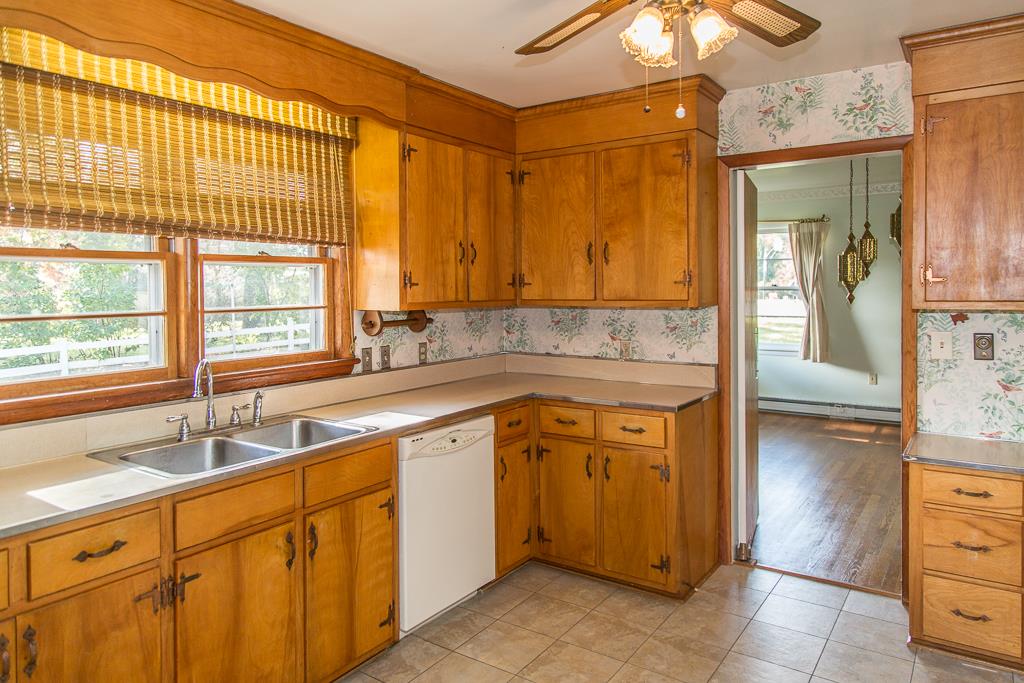 1700 Brunswick Road Waynesboro, VA 22980 - Photo 22 of 44 a kitchen with stainless steel appliances granite countertop a sink and a cabinets
