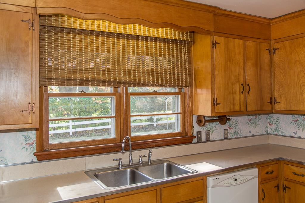 1700 Brunswick Road Waynesboro, VA 22980 - Photo 23 of 44 a kitchen with stainless steel appliances a sink window and cabinets