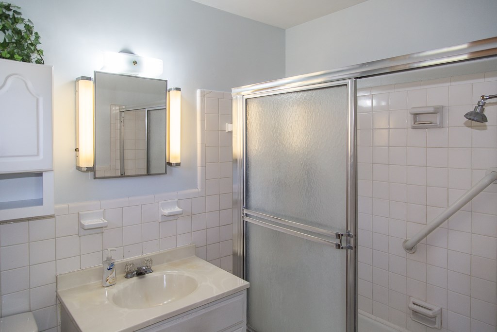 1700 Brunswick Road Waynesboro, VA 22980 - Photo 30 of 44 a bathroom with a sink and mirror