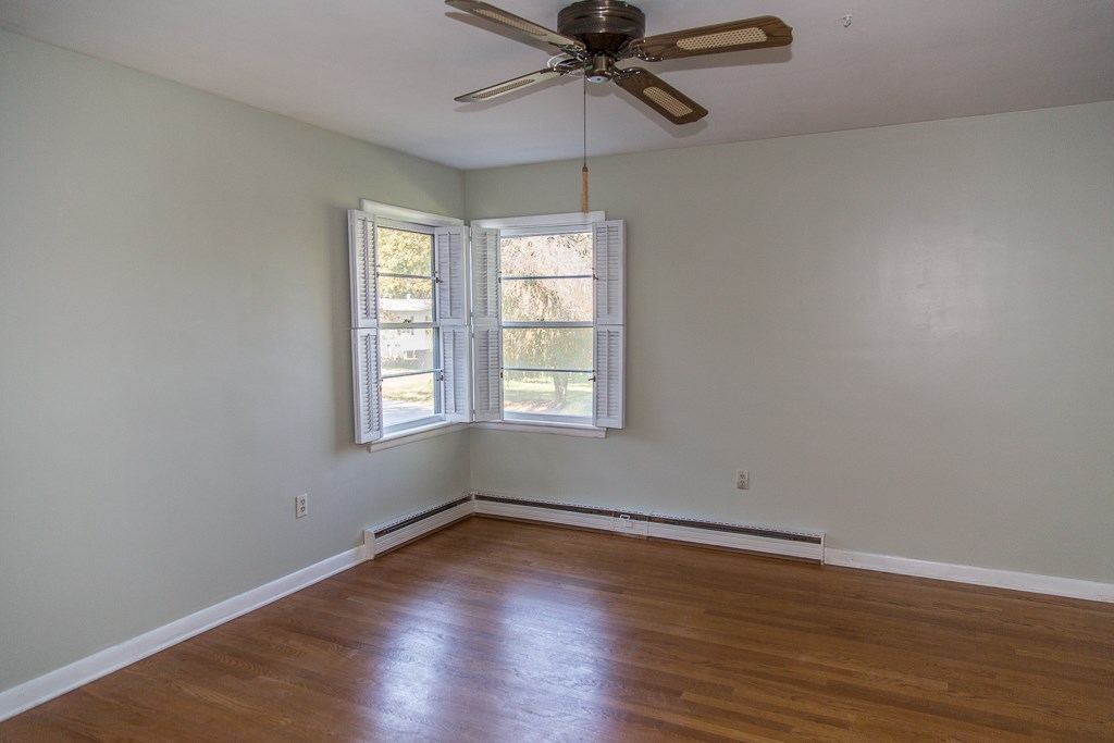 1700 Brunswick Road Waynesboro, VA 22980 - Photo 33 of 44 wooden floor in an empty room with a window