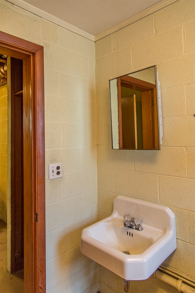 1700 Brunswick Road Waynesboro, VA 22980 - Photo 35 of 44 a bathroom with a sink and a mirror