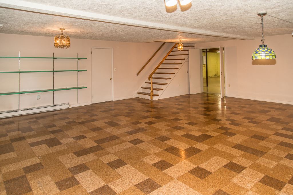 1700 Brunswick Road Waynesboro, VA 22980 - Photo 37 of 44 a view of a livingroom with wooden floor and stairs