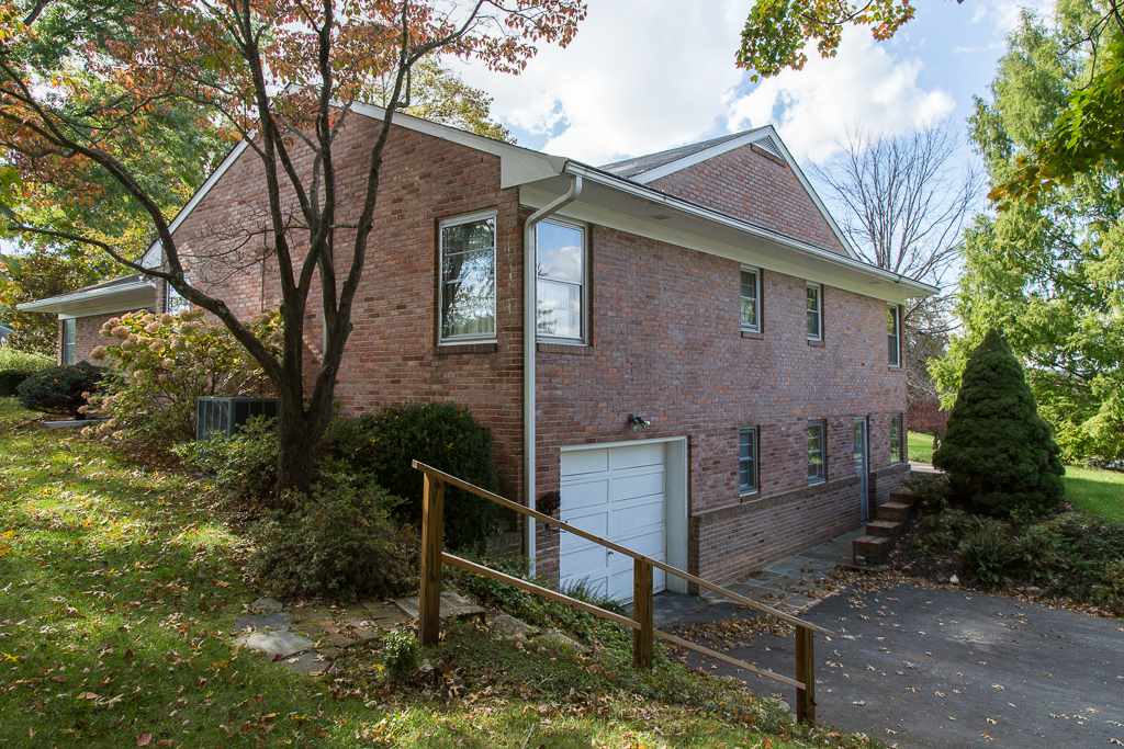 1700 Brunswick Road Waynesboro, VA 22980 - Photo 4 of 44 a front view of a house with plants