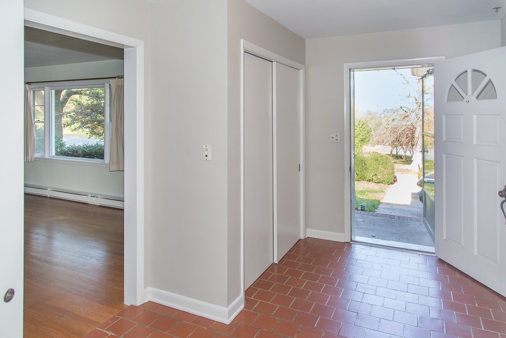 1700 Brunswick Road Waynesboro, VA 22980 - Photo 10 of 44 a view of a hallway with wooden floor and a dining room