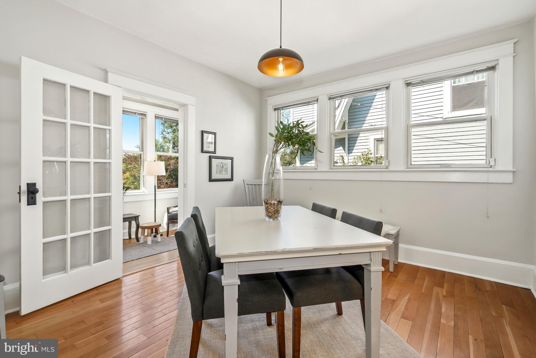 1403 Lawrence Street Northeast Washington, DC 20017 - Photo 14 of 29 Dining Open to Sunroom