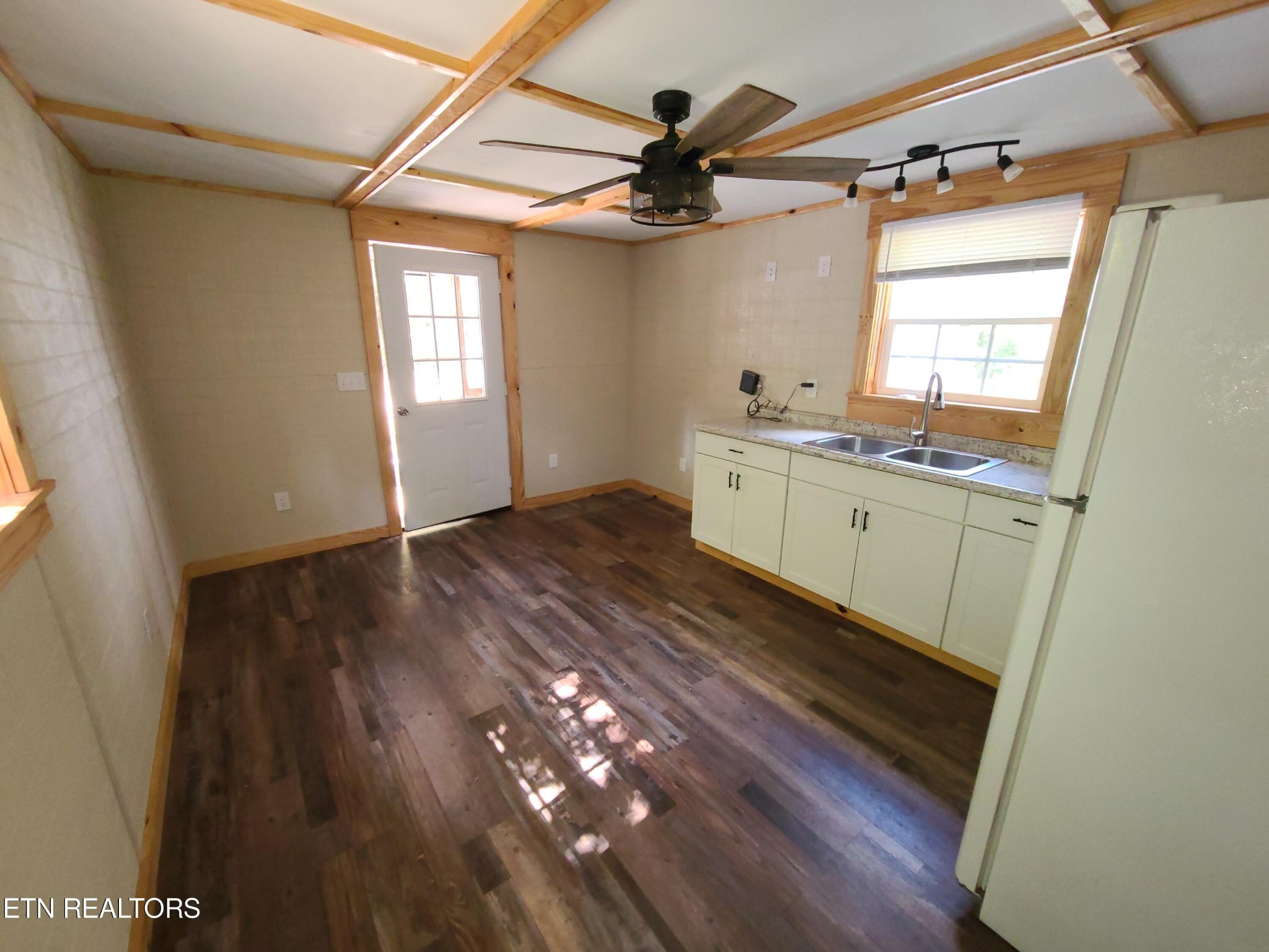 148 George Young Road Jamestown, TN 38556 - Photo 11 of 30 a room with wooden floors and a window