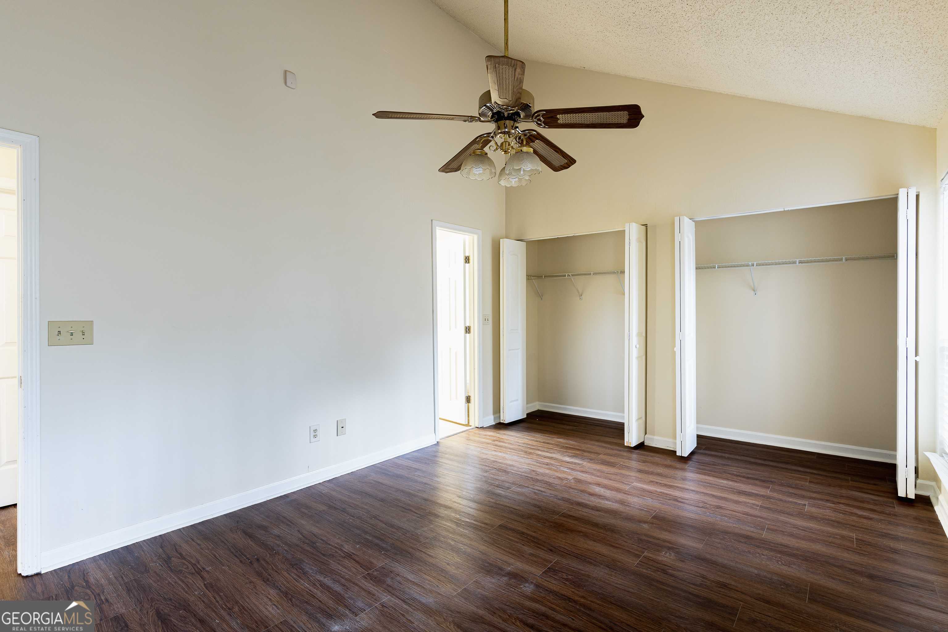 3821 Rex Mill Square Rex, GA 30273 - Photo 25 of 51 an empty room with wooden floor closet and windows