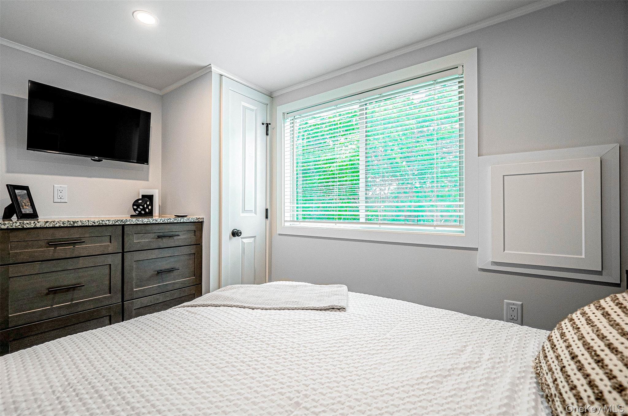 197 Wheeler Road, Unit 91 Florida, NY 10921 - Photo 12 of 48 Bedroom featuring ornamental molding and recessed lighting