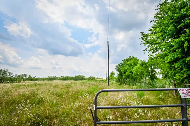a view of a lake and a yard