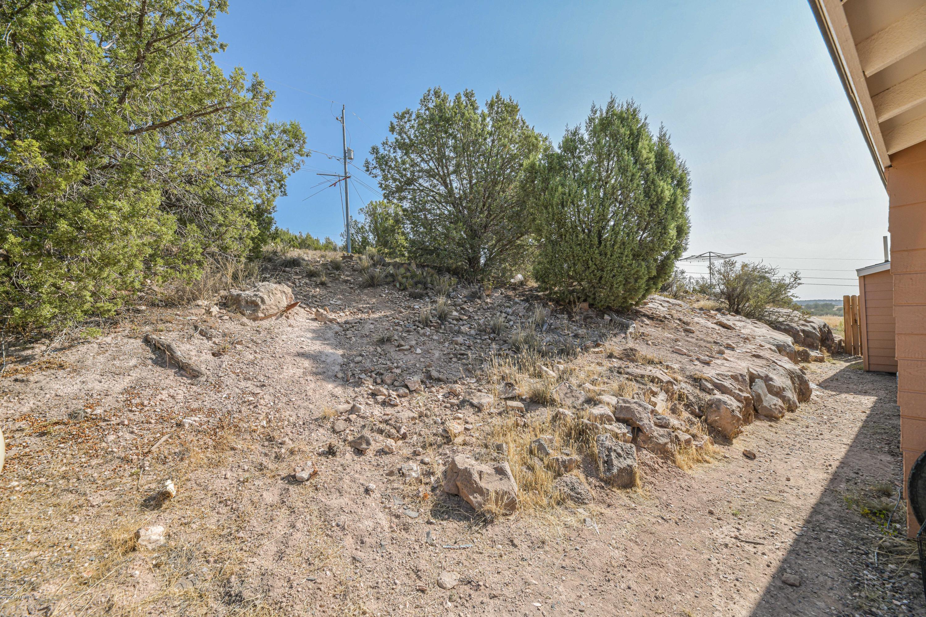 462 West Antelope Run Road Paulden, AZ 86334 - Photo 20 of 20 a view of a dry yard with trees