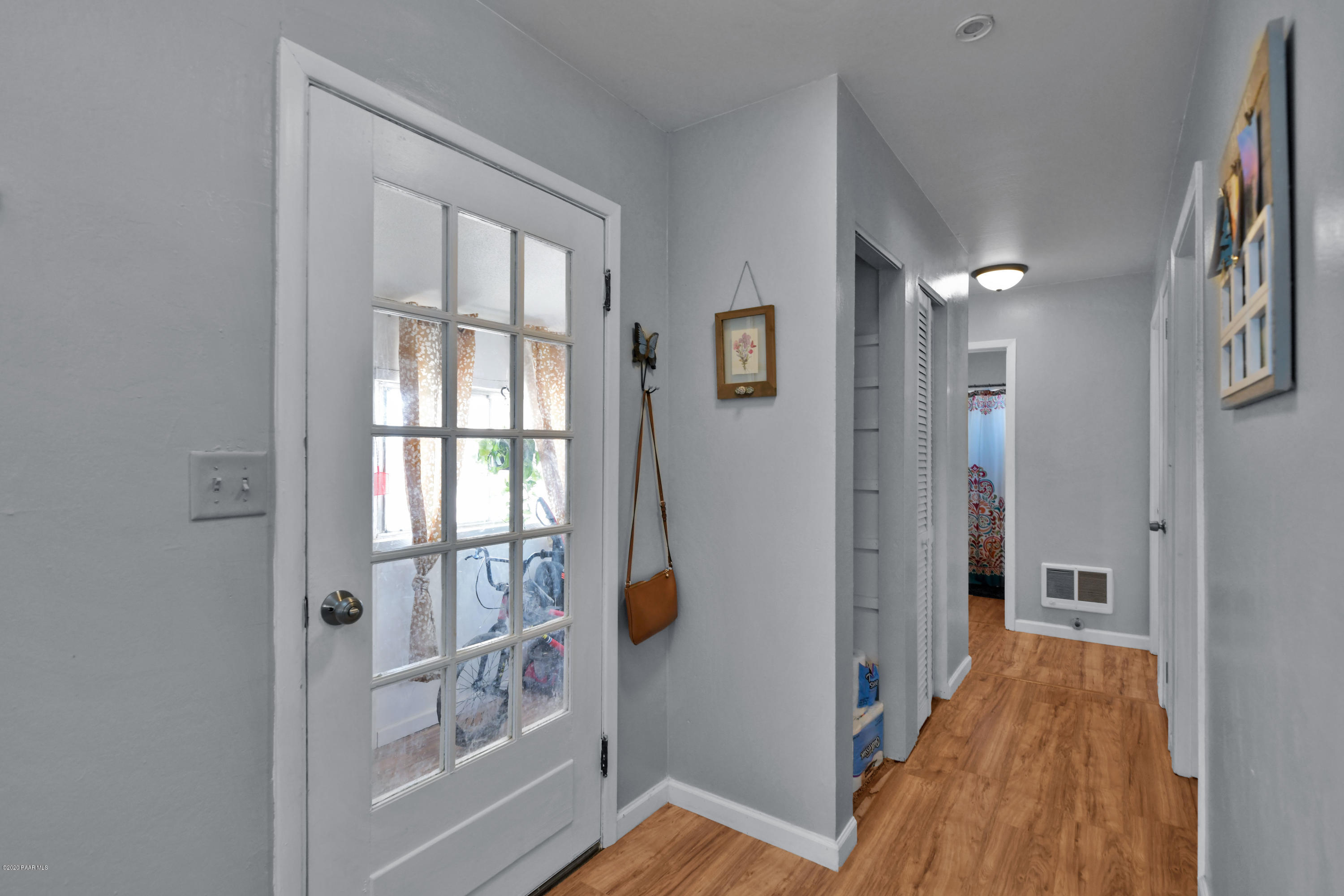 462 West Antelope Run Road Paulden, AZ 86334 - Photo 3 of 20 a view of an entryway with wooden floor and a livingroom