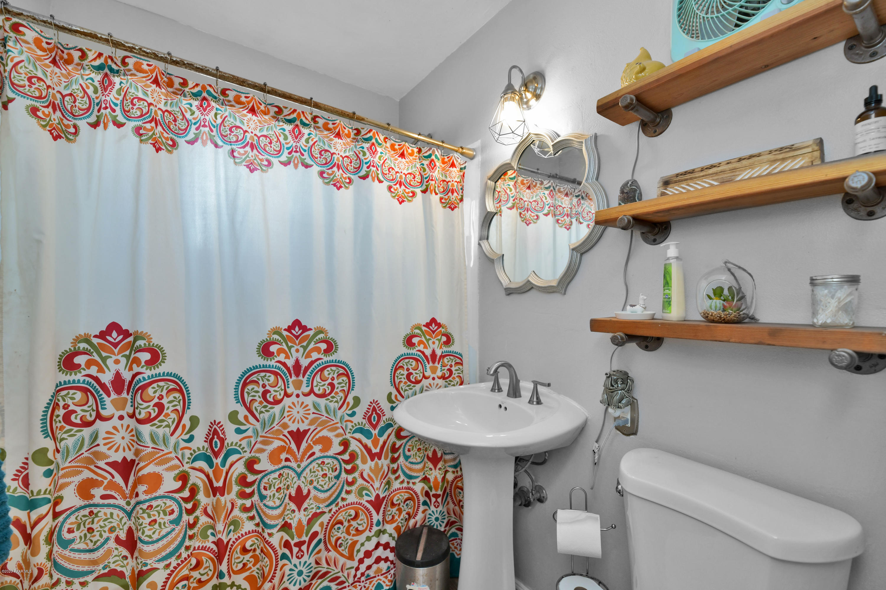 462 West Antelope Run Road Paulden, AZ 86334 - Photo 10 of 20 a bathroom with a sink mirror and vanity