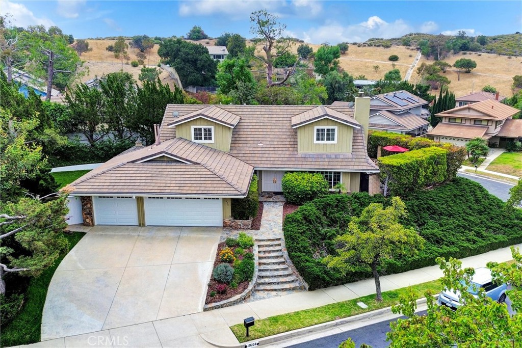 19238 Castlebay Lane Porter Ranch, CA 91326 - Photo 37 of 38 an aerial view of a house with a yard