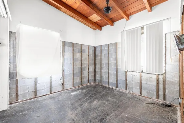 a view of a room with racks on the wall