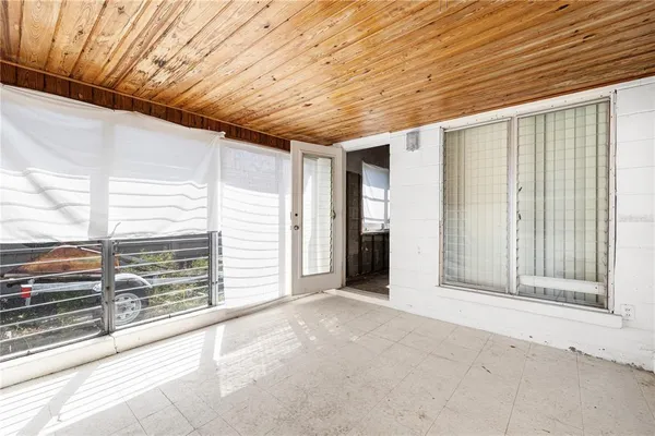 a view of entryway with wooden wall