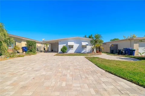 front view of a house with a patio
