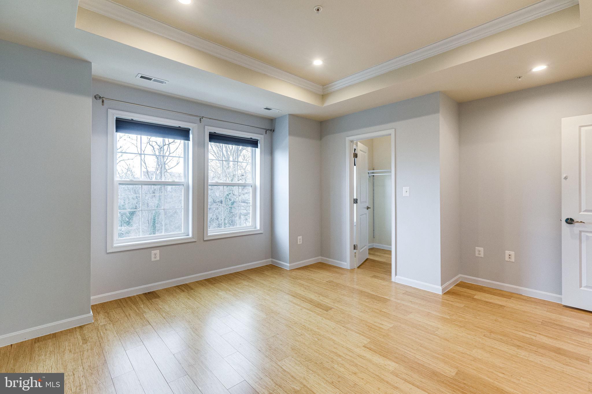 2508 Elvans Road Southeast Washington, DC 20020 - Photo 33 of 45 Bright primary bedroom with hardwood floors.