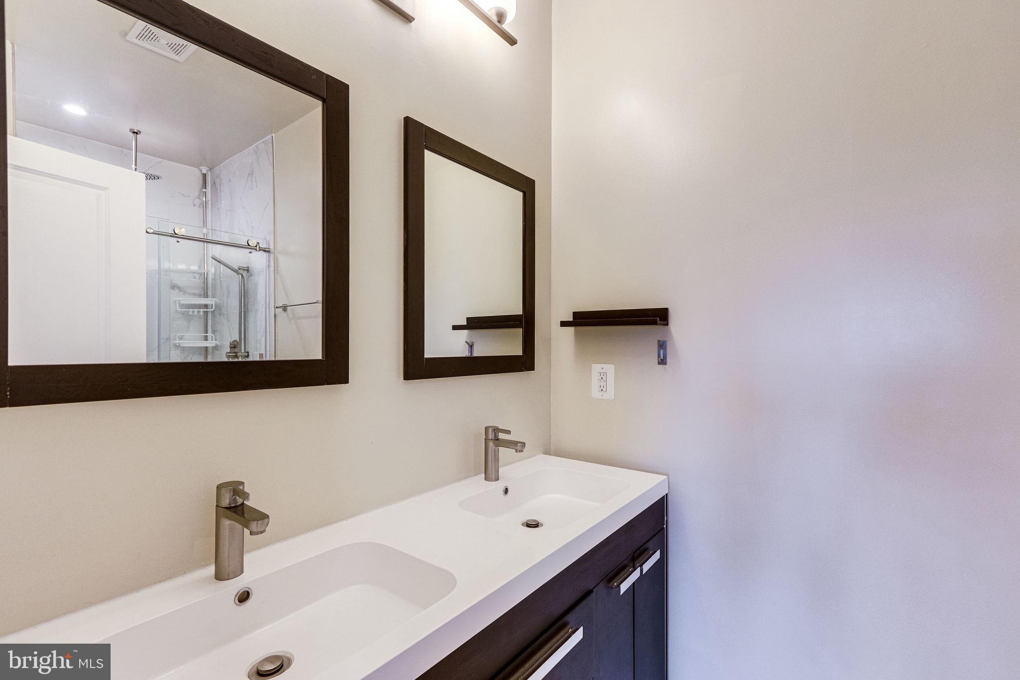2508 Elvans Road Southeast Washington, DC 20020 - Photo 34 of 45 Primary bath with double sink.
