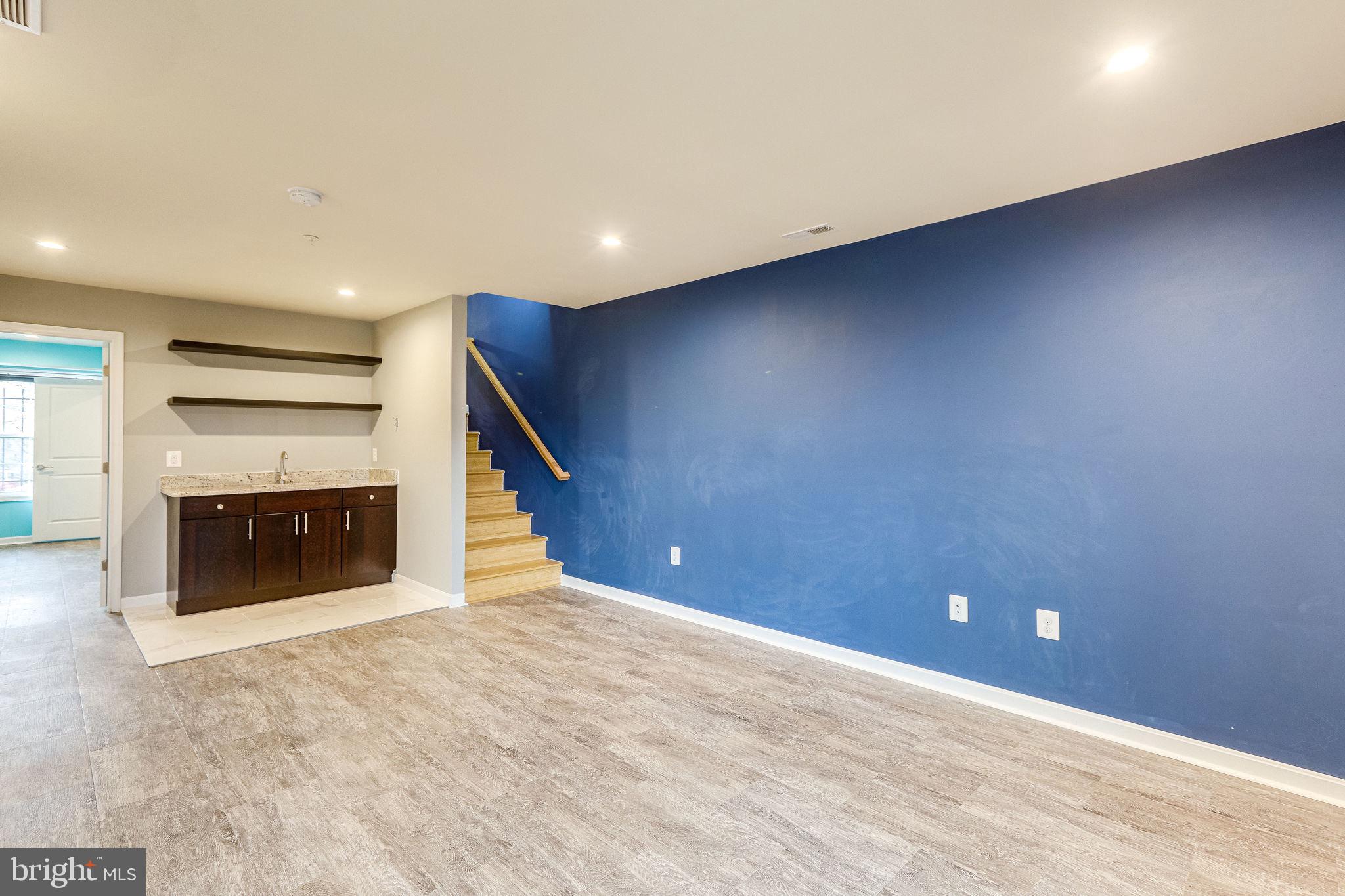 2508 Elvans Road Southeast Washington, DC 20020 - Photo 9 of 45 Family room has wet bar.