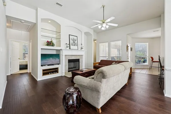 a view of a dining room with furniture window and wooden floor