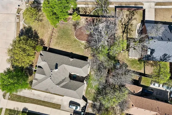 an aerial view of residential building with parking space