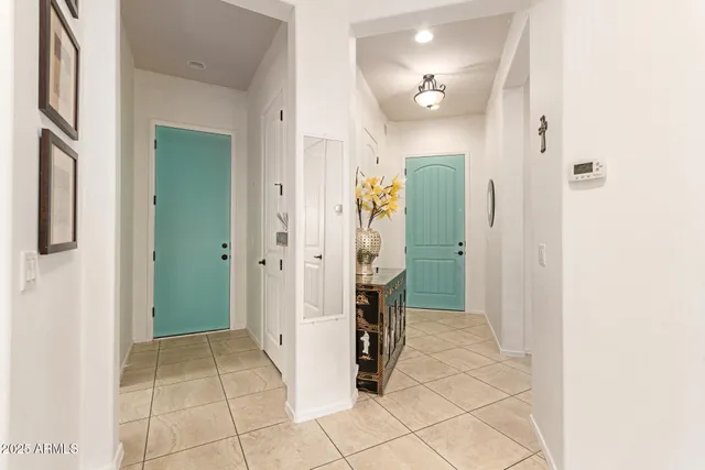 a bathroom with a double vanity sink mirror and double
