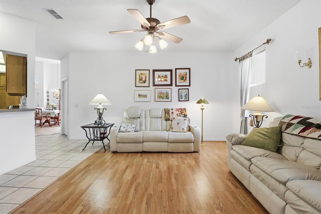 63 North Youngtree Point Lecanto, FL 34461 - Photo 16 of 48 a living room with furniture and a wooden floor