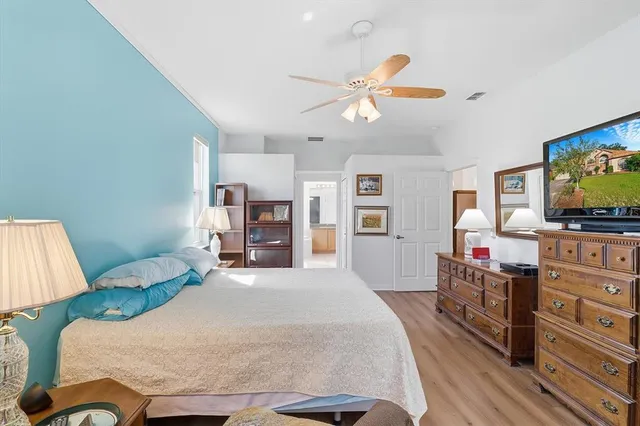 a bedroom with a bed and furniture