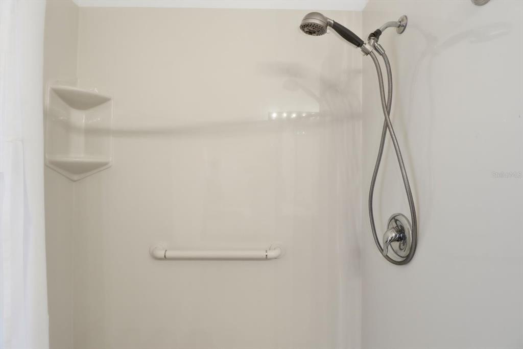 63 North Youngtree Point Lecanto, FL 34461 - Photo 30 of 48 a bathroom with a shower