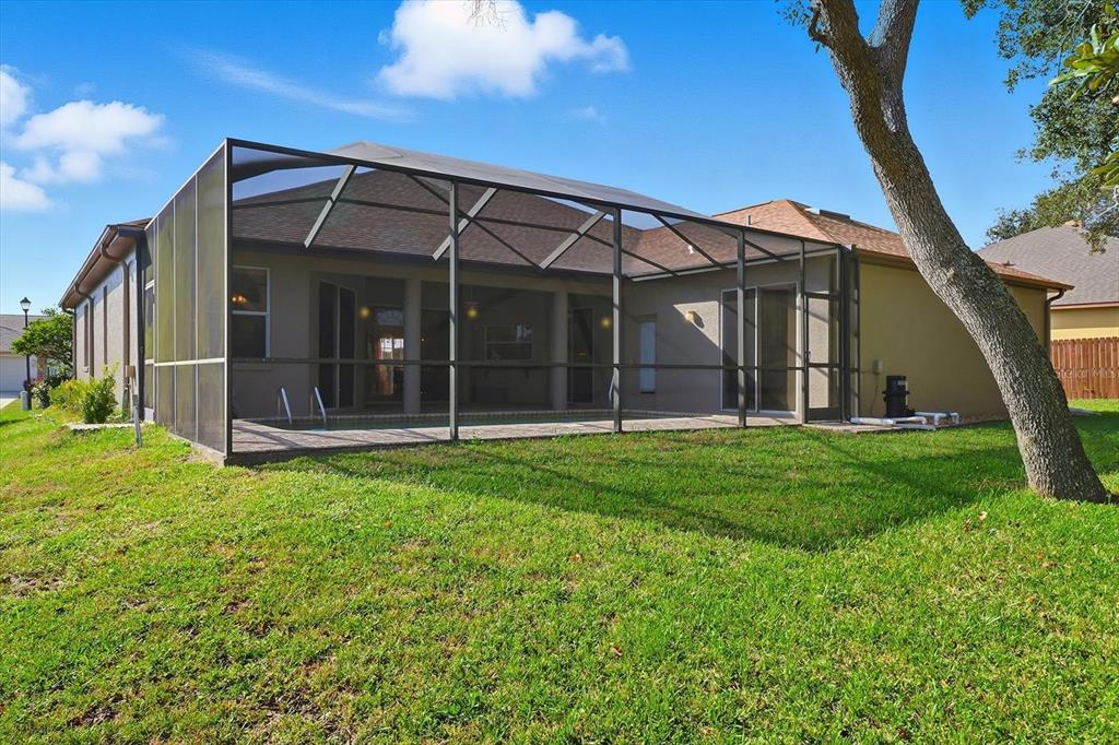 63 North Youngtree Point Lecanto, FL 34461 - Photo 37 of 48 a view of a house with backyard