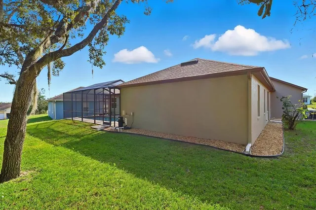 a view of backyard with a tub