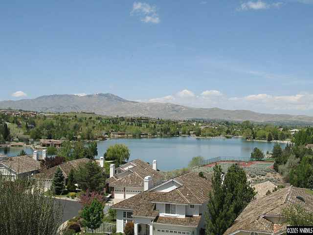 6107 Carriage House Way Reno, NV 89519 - Photo 1 of 9 a view of lake and mountain
