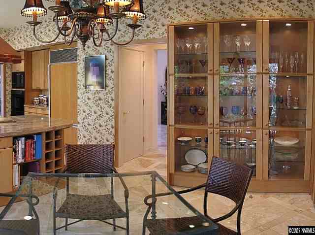 6107 Carriage House Way Reno, NV 89519 - Photo 8 of 9 a view of a chairs and tables in kitchen
