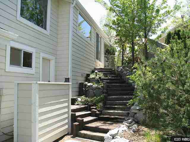 6107 Carriage House Way Reno, NV 89519 - Photo 9 of 9 a view of a house with a yard