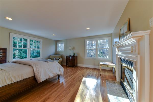 24 Hillside Road Wellesley, MA 02481 - Photo 11 of 17 a bed room with a bed and a large window