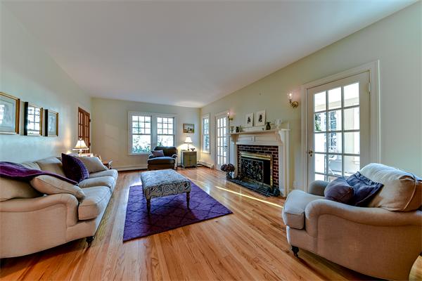24 Hillside Road Wellesley, MA 02481 - Photo 4 of 17 a living room with furniture and a fireplace