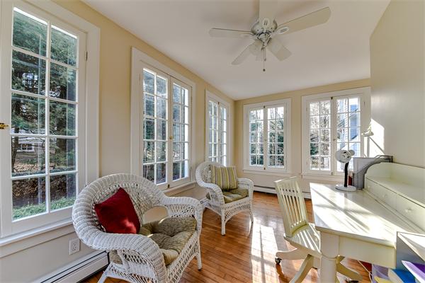 24 Hillside Road Wellesley, MA 02481 - Photo 5 of 17 a living room with furniture and a large window