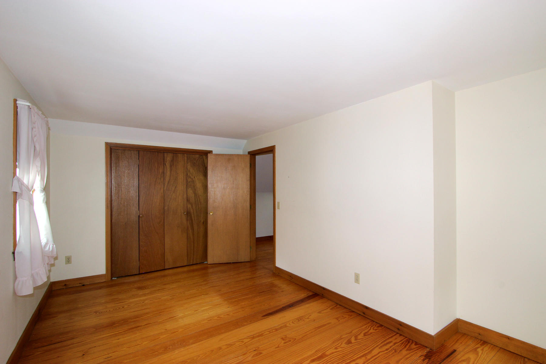 216 Cathedral Road Brewster, MA 02631 - Photo 25 of 56 a view of an empty room