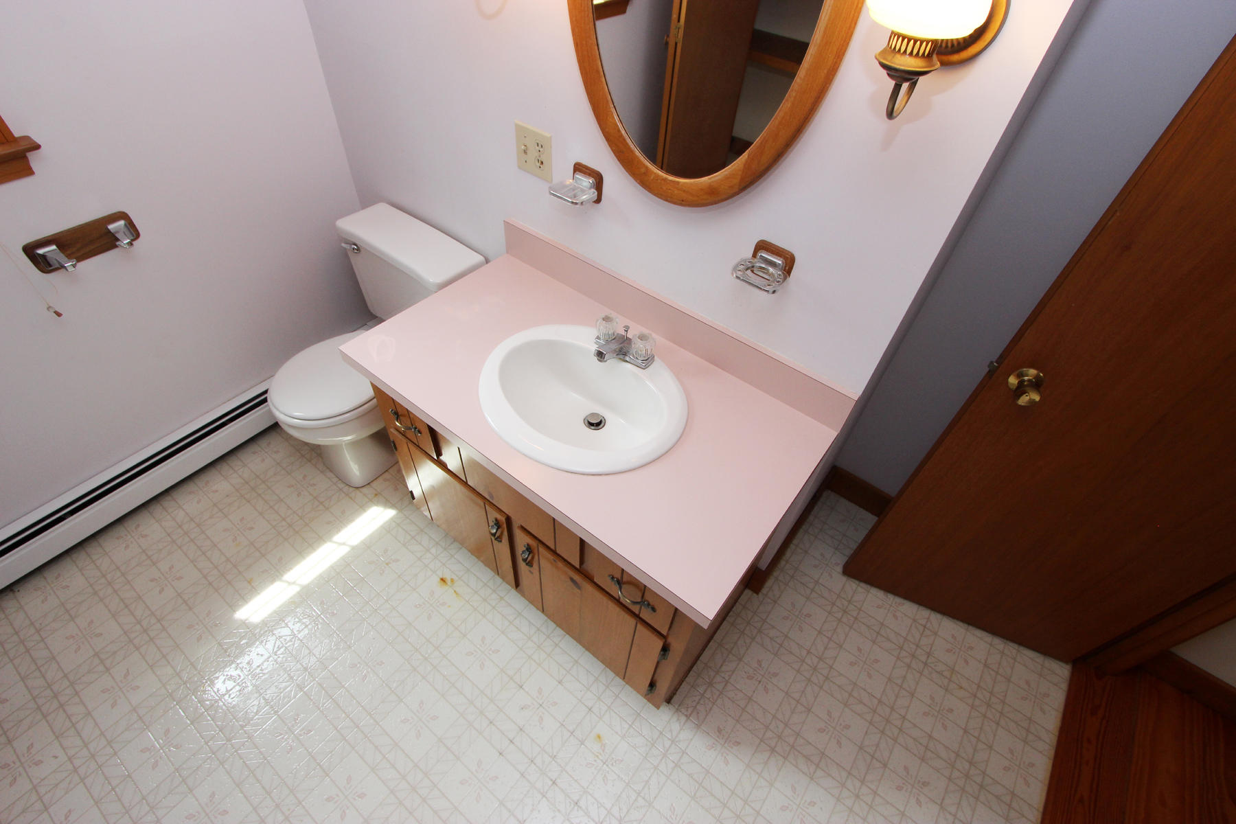 216 Cathedral Road Brewster, MA 02631 - Photo 31 of 56 a bathroom with a sink a toilet and a mirror