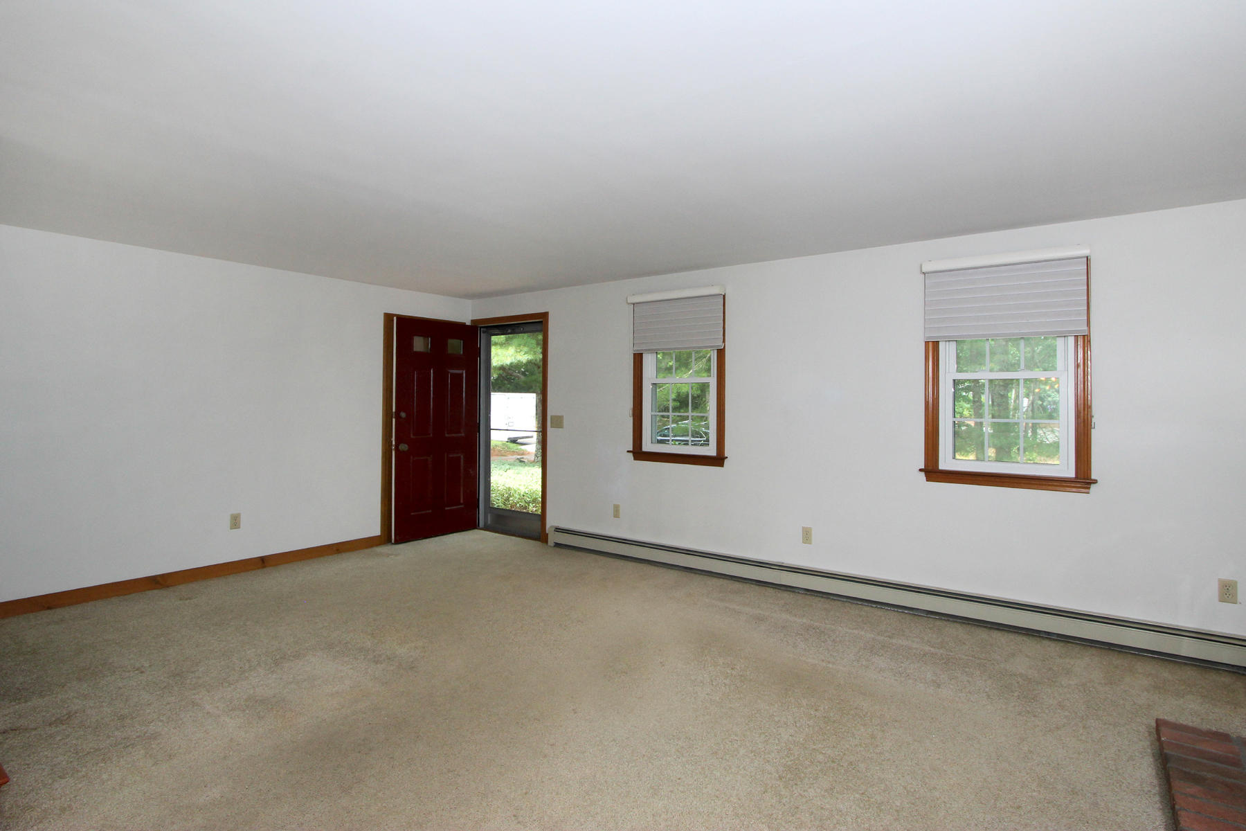 216 Cathedral Road Brewster, MA 02631 - Photo 7 of 56 an empty room with windows