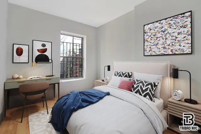 a bedroom with bed and a window