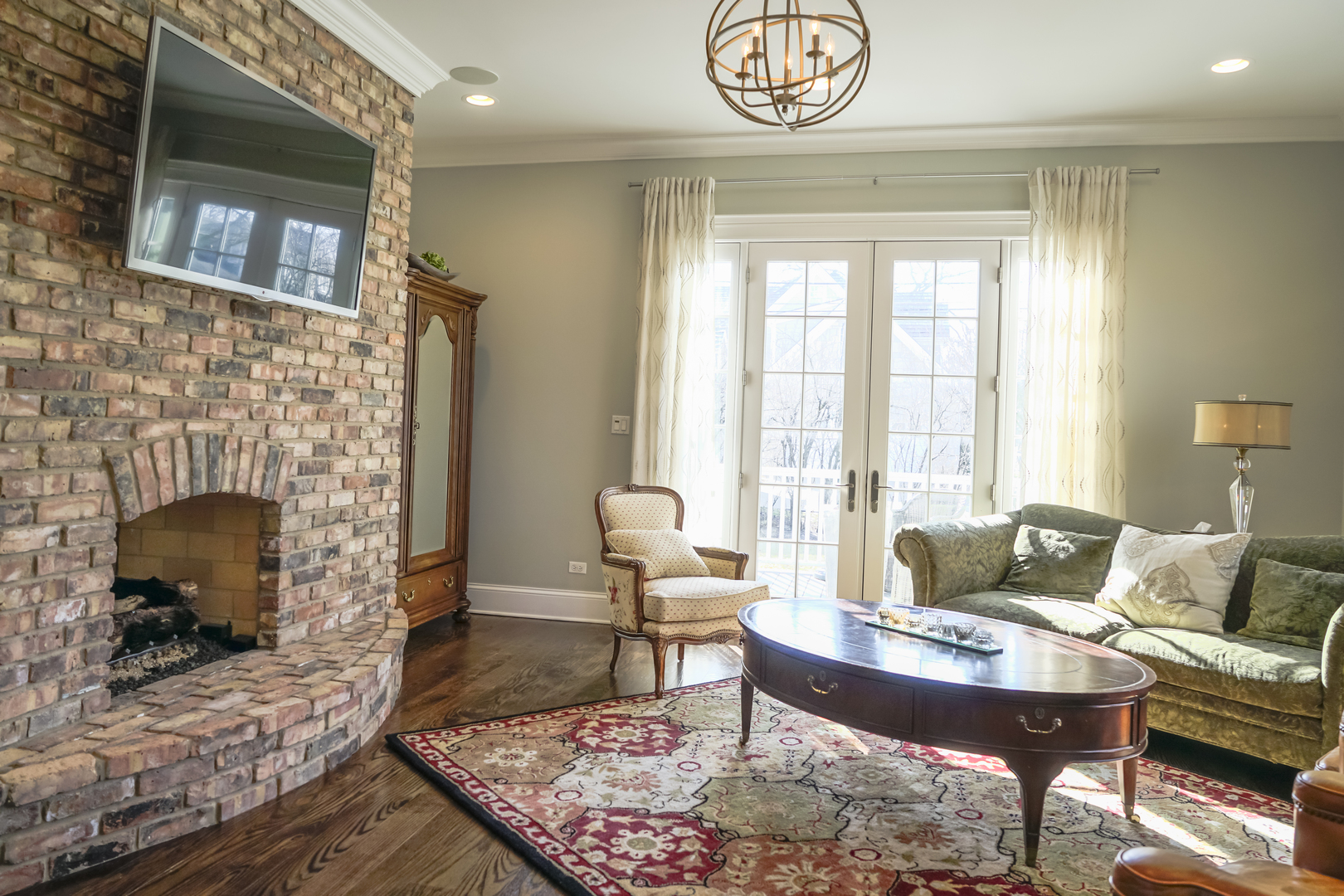 4800 Wolf Road Western Springs, IL 60558 - Photo 5 of 47 a living room with furniture and a fireplace